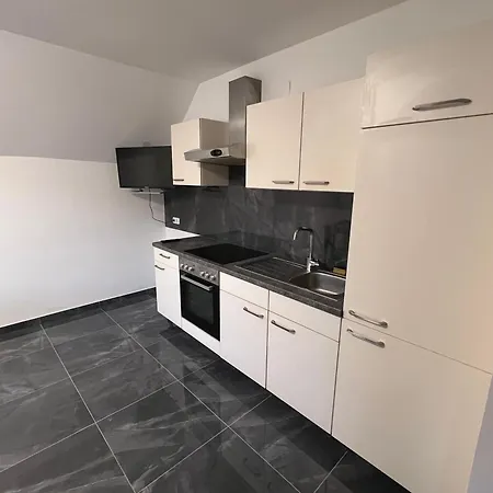 Krasniqi * Honigsberg